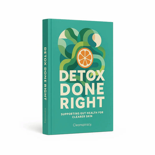 Book titled 'Detox Done Right' with a green cover and orange slice illustration on a white background