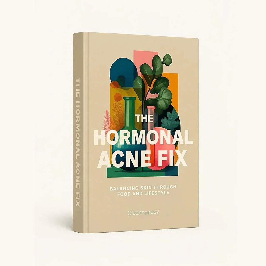 Book titled 'The Hormonal Acne Fix' with colorful design on a beige background